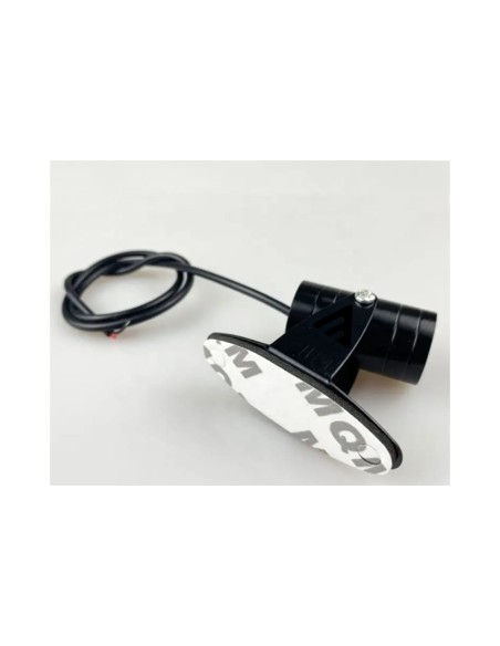 Projector with supplied adhesive mounting pad